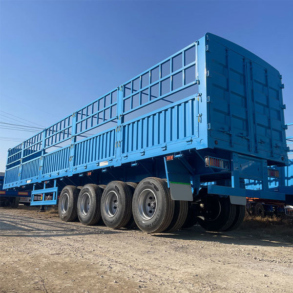High-load steel-framed semi-trailer for freight, four axles, 50-60 ton bulk cargo trailer.