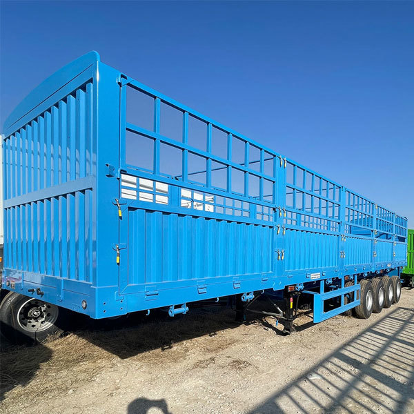 High-load steel-framed semi-trailer for freight, four axles, 50-60 ton bulk cargo trailer.