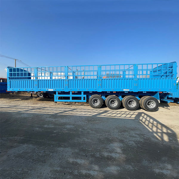 High-load steel-framed semi-trailer for freight, four axles, 50-60 ton bulk cargo trailer.
